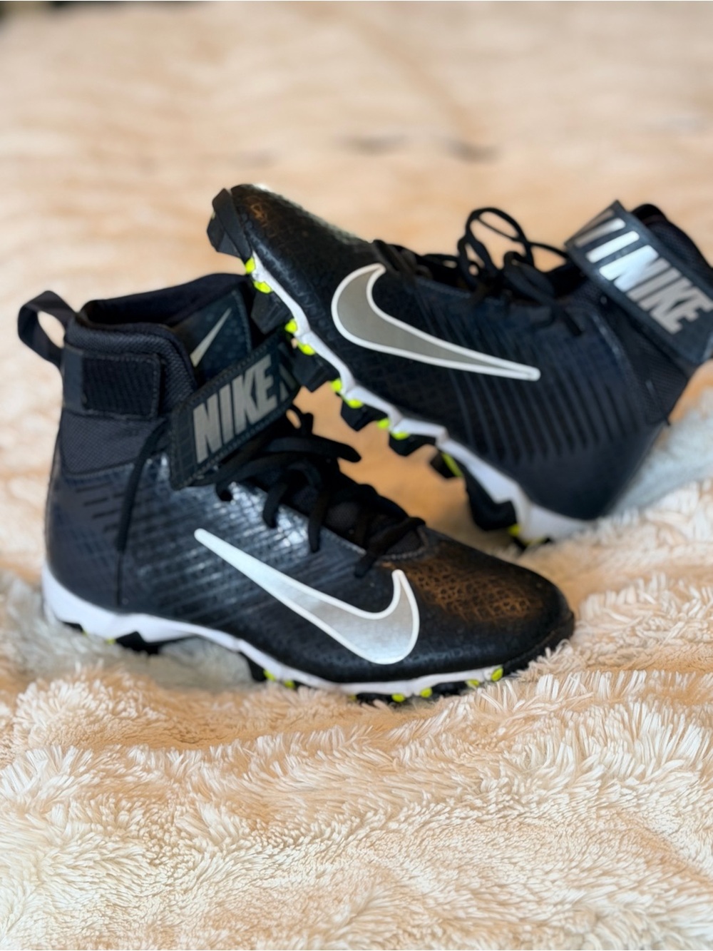 Nike Black Cleats with White Swoosh and Neon Yellow Accents